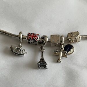 Pandora travel team bracelet and charms